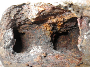 excess corrosion in exhaust chamber